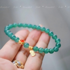Blue Ice Jade Bracelet Adorned with Red Agate and Gold Beads